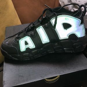 Nike uptempos never worn...7y 9/9.5 woman